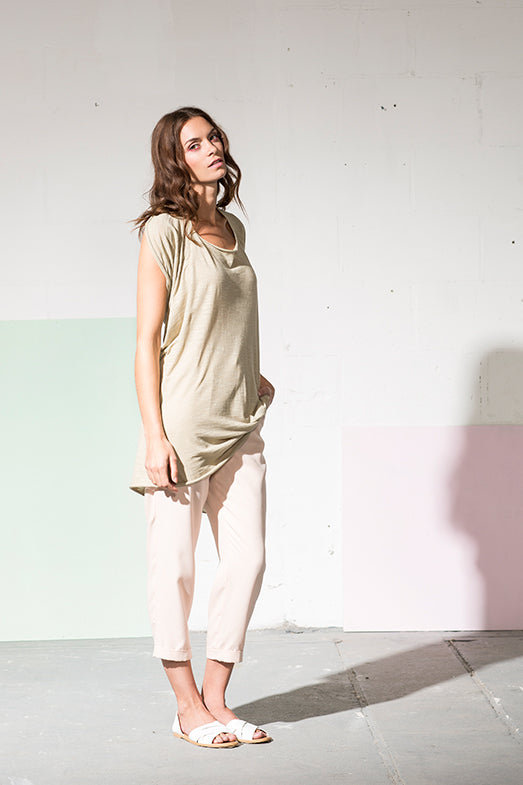 Multifunctional khaki dress which can be worn as a crop top, t-shirt with scarf or neckholder. 