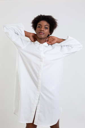 Multifunctional white shirt which can be worn as a long shirt, dress or tunic.